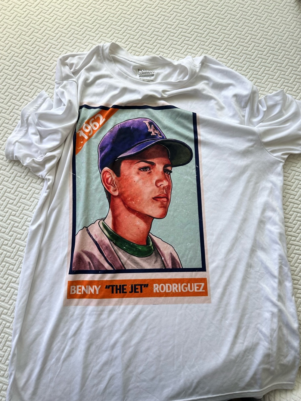 Benny "The Jet" Rodriguez Graphic Tee – White with Purple & Green Artwork
